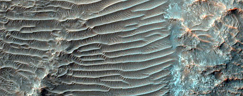 Mafic Mineral Exposures near Oenotria Scopuli