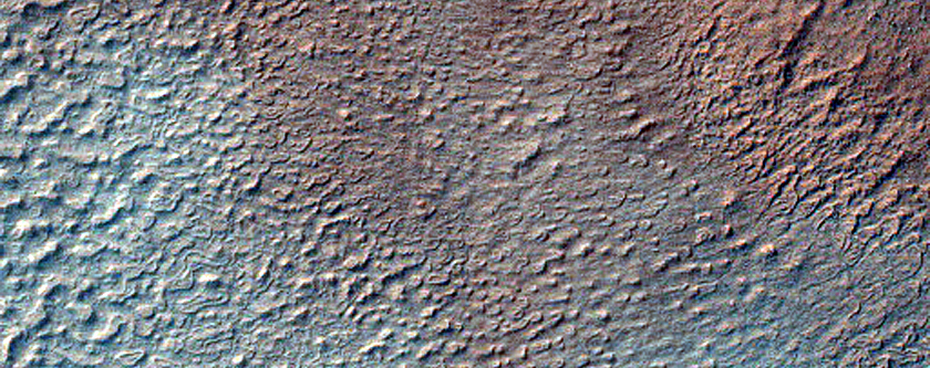 Dipping Layers near Mound in Hellas Planitia