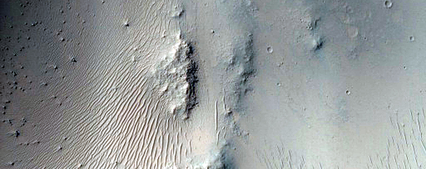 Layers in Crater Wall in Small Crater inside Huygens Crater