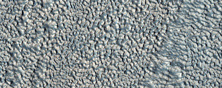 Impact Crater Exposing Structure within Lobate Debris Apron