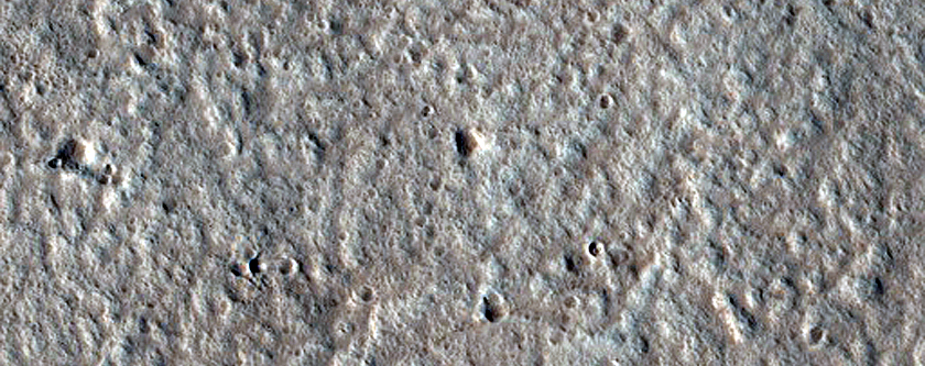 Pole Facing Deposit in 10-Kilometer Crater