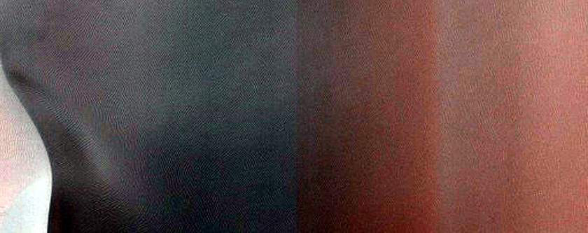 Defrosting of Kaiser Crater Dunes