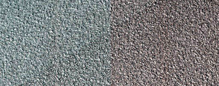 Exposed Layers in Olympia Mensae Icy Outliers