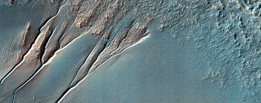 Narrow Gully Channels in Well-Preserved 3-Kilometer Impact Crater