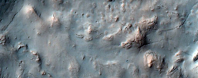 Collapsed Crater Rim and Possible Ice Flow