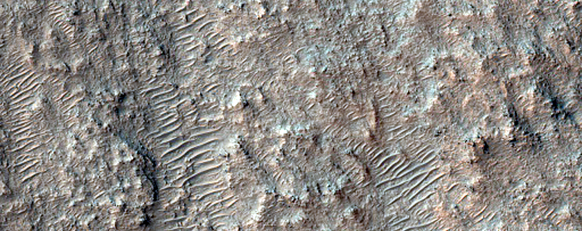 Possible Mafic Minerals on Plains Northwest of Hellas Planitia
