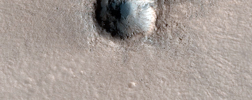 Small Crater with Dark Ejecta in Northern Plains