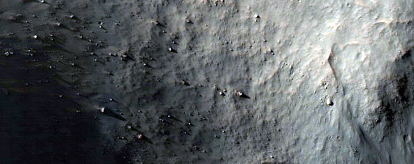 Possible Bedrock Exposure on Floor of 21-Kilometer Crater in Tyrrhena Terra