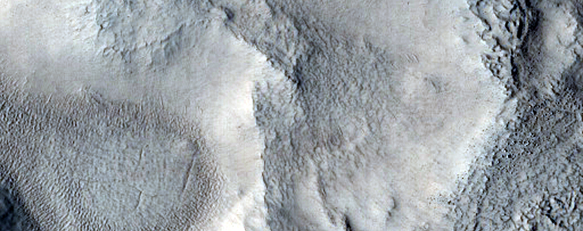 Dipping Layers in Craters in Northern Mid-Latitudes