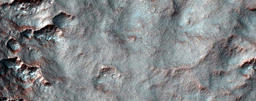 Scalloped Depressions and Seasonal Frost