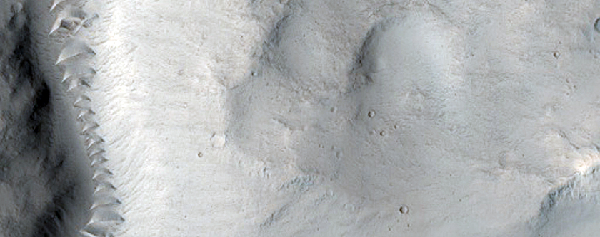 Channel Along Northern Mid-Latitude Crater