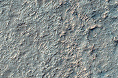 Western Rim of Slipher Crater and Terrain to South