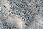 Layered Features in Depressions in Deuteronilus Mensae