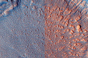 Crater with Dipping Layers South of Deuteronilus Mensae