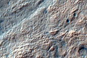 Possible Pyroxene-Rich Materials on Terra Cimmeria Crater Floor
