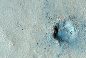Small Crater with Fresh Looking Ejecta on Glacier