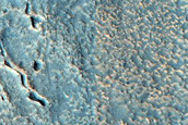 Cracks Forming Ridges and Troughs in Deuteronilus Mensae