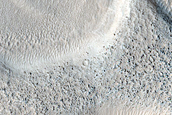 Dipping Layers in Craters in Northern Mid-Latitudes