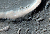 Slump over Circular Formation with Debris
