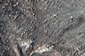North-Pole-Facing Deposit in Crater Associated with Headwall Erosion