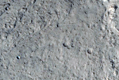 North-Pole-Facing Deposit in Crater Associated with Headwall Erosion