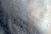 North-Pole-Facing Deposit in Crater Associated with Headwall Erosion