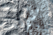 Crater with Narrow Rim near Reull Vallis