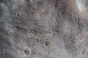 North-Pole-Facing Deposit in Crater Associated with Headwall Erosion