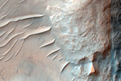 Fractured Crater Floor with Altered Minerals