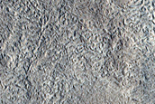 North-Pole-Facing Deposit in Crater Associated with Headwall Erosion