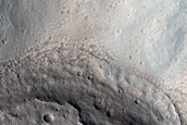 North-Pole-Facing Deposit in Crater Associated with Headwall Erosion