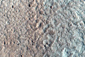 North-Pole-Facing Deposit in Crater Associated with Headwall Erosion