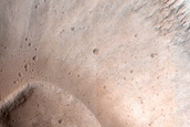 North-Pole-Facing Deposit in Crater Associated with Headwall Erosion