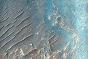 Layered Crater Wall Material in Mouth of Kasei Valles