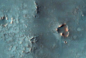 Secondary Craters and Sinuous Feature