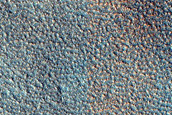 Edge of Ejecta from Olivine-Rich Crater