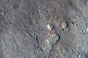 North-Pole-Facing Deposit in Crater Associated with Headwall Erosion