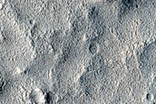 Layered Deposit in Crater on Cerulli Crater Floor
