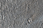 North-Pole-Facing Deposit in Crater Associated with Headwall Erosion