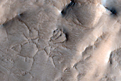 Layers Along Top of Crater North of Antoniadi Crater