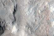 North-Pole-Facing Deposit in Crater Associated with Headwall Erosion