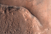 North-Pole-Facing Deposit in Crater Associated with Headwall Erosion