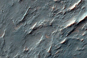 Phyllosilicates in Crater Ejecta in Southern Thaumasia Planum