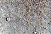 North-Pole-Facing Deposit in Crater Associated with Headwall Erosion