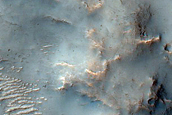 Channel Interacting with Ejecta in Tyrrhena Terra