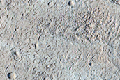 North-Pole-Facing Deposit in Crater Associated with Headwall Erosion
