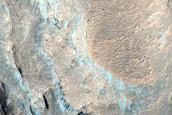 Fracturing Degraded Crater Deposit in Northern Arabia Terra