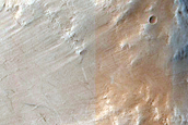 Possible Pyroxene Exposures on Arabia Terra Crater Wall