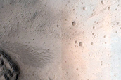 North-Pole-Facing Deposit in Crater Associated with Headwall Erosion