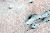 Dune Interaction with Residual Polar Ice